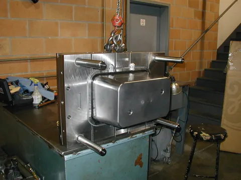 Mold on the bench, rigged to the overhead hoist